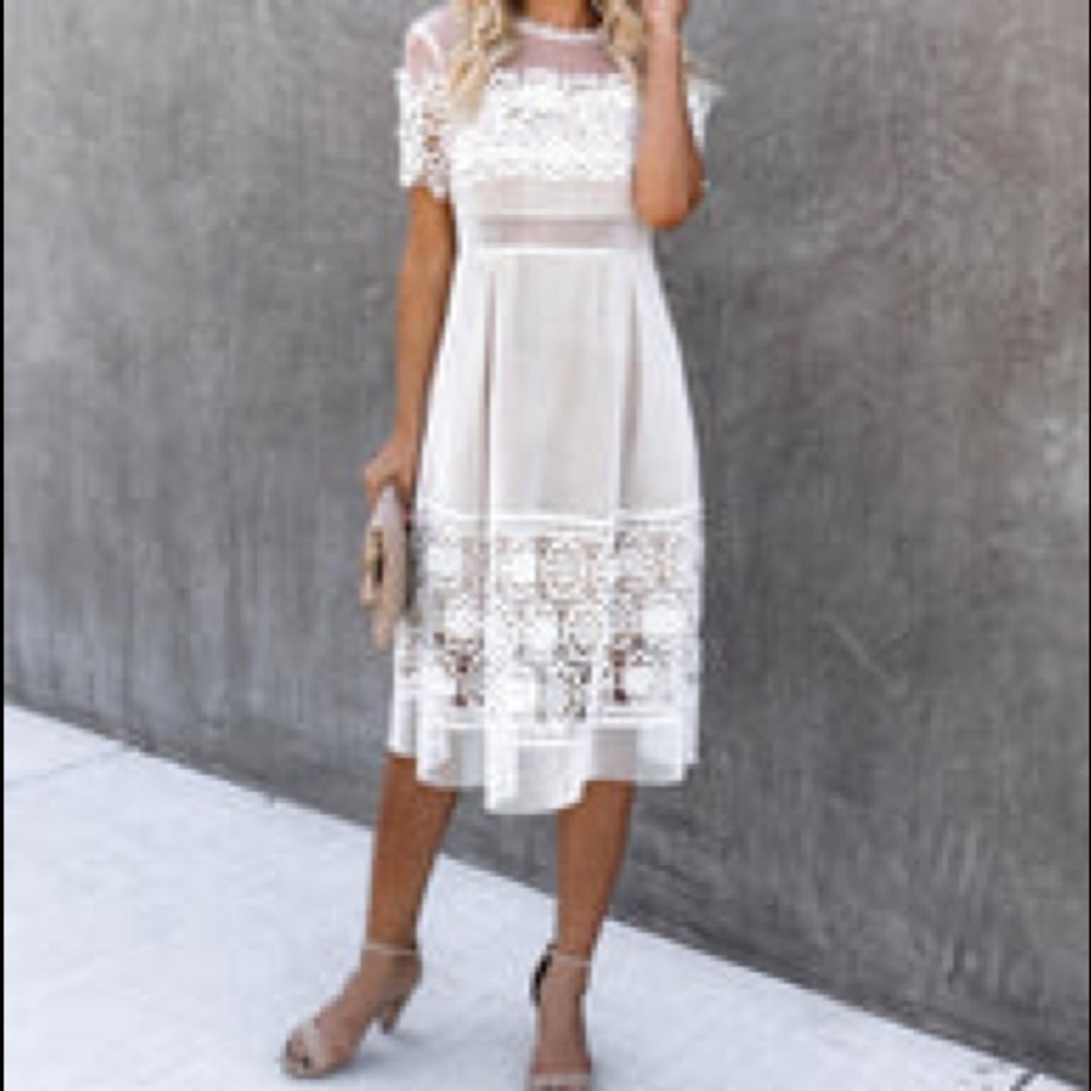 Vici, endless rose brand. White and nude dress. New. Never been worn.